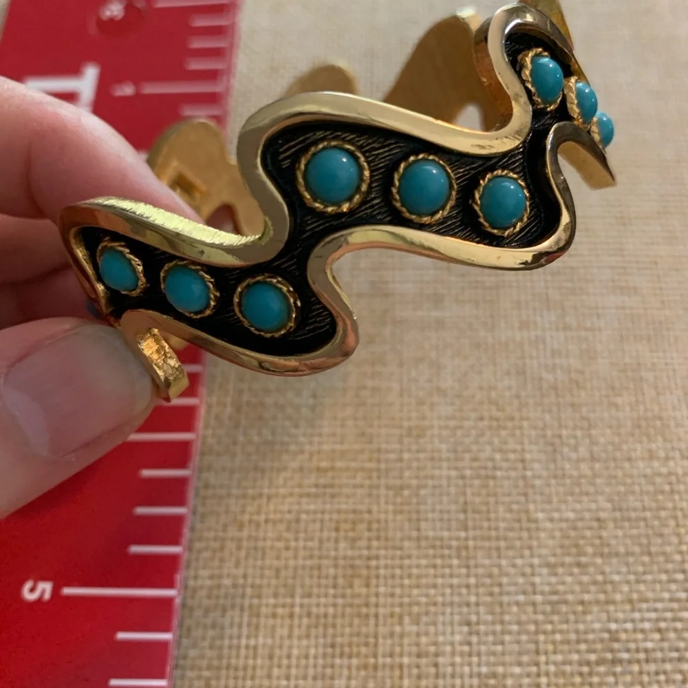 Striking vintage turquoise color black and gold cuff bracelet